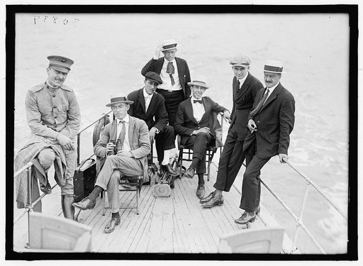 PRESS CORRESPONDENTS. GROUP ON BOAT
