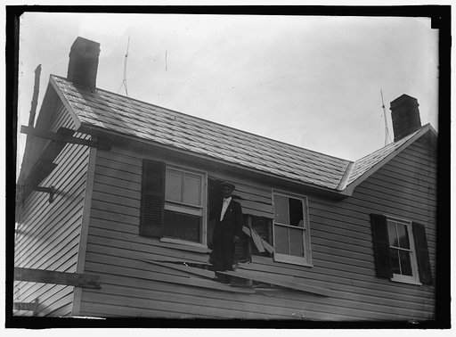 INDIAN HEAD, MD. NAVY PROVING GROUND. RESIDENCE OF GEORGE SWANN, DAMAGED BY 16' SHELL THAT HIT ANOTHER IN SANDBANK, AND WAS DEFLECTED OVER COUNTRYAT 3/4 ANGLE