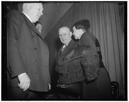 Labor whispers. Washington, D.C., Dec. 11. Secretary of Labor Frances Perkins went into a huddle with William Green, President of the American Federation Labor, as both attended the Conference of Industry and Labor today