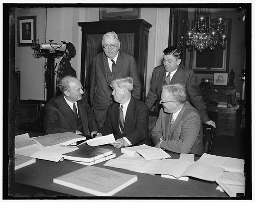 House Appropriations Committee hears Secretary of Treasury and Budget Director. Washington, D.C., Dec. 16. Secretary of the Treasury Morgenthau and Acting Budget Director Daniel Bell discussed federal finances today with the House Appropriations Subcommittee considering the Treasury-Post Office Depa
