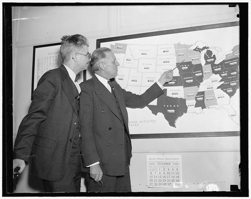 Dr. John W. Miller, (left) pathologist, and Dr. R.R. Sayers, medical officer in charge of office of Industrial Hygiene, U.S. Public Health Service