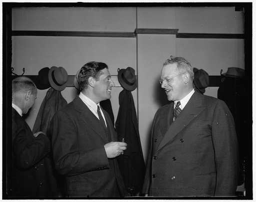 High finances. Washington, D.C., Dec. 19. Louis H. Seagrave, (right) former head of the United founders Corp., testifying at the Sec. Investment Trust Inquiry today told how he expanded a $3,182 investment to a heavy interest in companies with assets of more than $1,000,000,000. The Sec. is studying