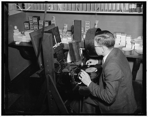 Bureau of Standards. Standardization of card colors: Kenneth Kelley judging colors of dyes