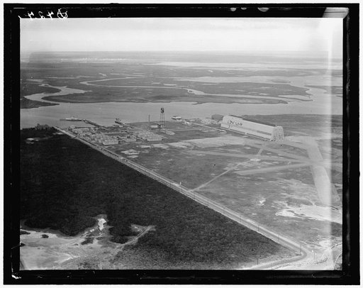 Air shot, Cape May (N.J.) Coast Guard Station Airport, showing new runways and the old air ship hanger built by the Navy for one of the treaty Zeps after the World War, but now not in use