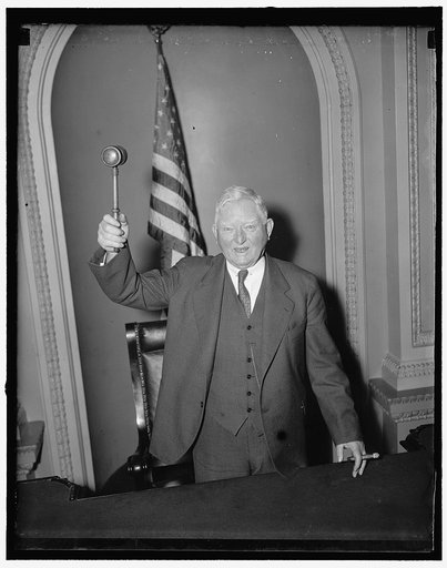Ready for action. Washington, D.C., Dec. 30. With his favorite gavel primed for calling the 75th Senate session to order, Vice President Jon N. Garner posed for cameramen today at his usual spot on the Senate rostrum. The Vice President appears the picture of health after a long vacation at his home