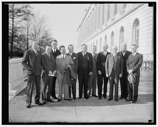 New Democratic Senators welcomed. Washington, D.C. Jan. 4. Senator Joseph T. Robinson's first act today, following his re-election as majority leader, was to welcome the new Democratic Senators. Here we see, left to right: Senator Herbert Hitchcock, South Dakota; Senator Prentiss M. Brown, Michigan;