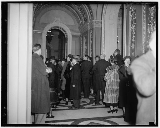 Throng at opening session. Washington, D.C., Jan. 5. Part of the huge crowd outside the House chamber waiting for admittance to view the opening of the 75th session. Tickets were at a premium