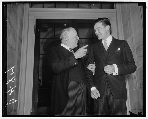 Veterans advice for rookie Senator. Washington, D.C., Jan. 5. Senator David I. Walsh, Democrat from Massachusetts, greets the new junior Senator, Henry [Cabot] Lodge, Jr., Republican from the bay state. Senator Lodge is 34 years old. He covered the Capitol for a Boston newpaper about 10 years ago