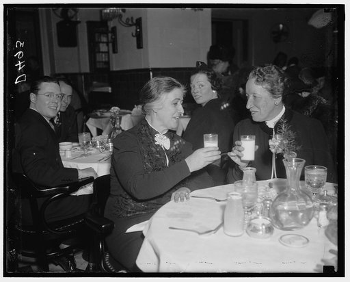 A toast. Washington, D.C., Jan. 6. A "milktoast" from a veteran to a rookie. Rep. Nan Wood Honeyman, member of the house from Oregon, and Rep. Caroline O'Day of New York, lunch in the house restaurant before listening to President Roosevelt's address to the joint session