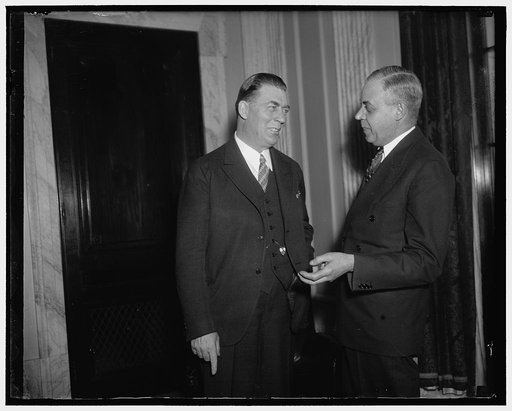 Old Rail telegraphers now members of Congress. Washington, D.C., Jan. 9. Not so many years ago these two gents were both "pounding brass" on the Burlington. Now they are both members of Congress but still carry union cards in the Order of Railroad Telegaphers. Senator Ed Johnson, (left) new Democrat