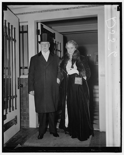 Chief Justice Hughes & Mrs. Hughes leaving home for White House