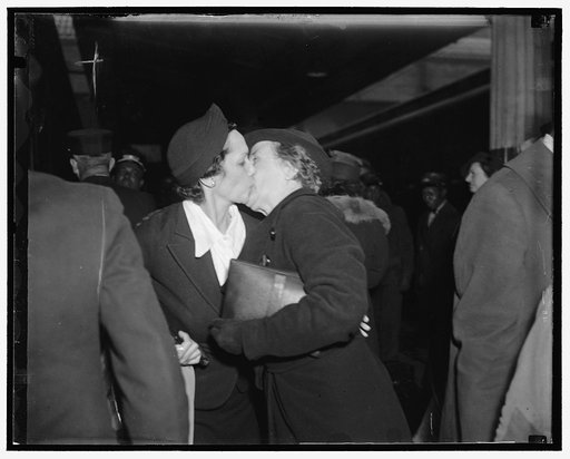 Mrs. Garner greets daughter-in-law. Washington, D.C. Jan. 18. Mrs John N. Garner, wife of the Vice President, greets her daughter-In-law Mrs. Tully C. Garner, with a kiss as she arrived at Union Station today with her husband and daughter Genevieve. The family came to the Capitol to attend the Inaug