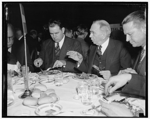 At housing luncheon. Washington, D.C. Jan. 19. Governor Olin D. Johnson, South Carolina, and Secretary of Commerce Daniel A. Roper, pictured at housing luncheon for state Governors at the Mayflower Hotel today. Secretary Roper hails from South Carolina