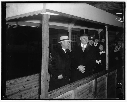PMG Farley and Governor of Indiana. Washington D.C., Jan. 20. Postmaster General Farley and Governor Townsend, of Indiana, as they watched the Inaugural parade today