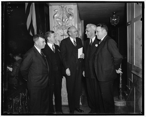 Council of State Governments convenes. Washington D.C. Attorney General Homer S. Cummings was principal speaker today as the third General Assembly of the Council of State Goverments convened at the Mayflower Hotel. He is shown with delegates to the councils. Left to right: Commissioner William Elli