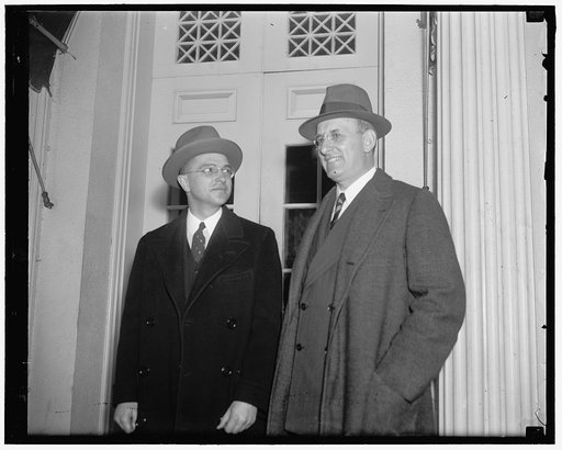 Secretary and new Undersecretary of Treasury see President Roosevelt. Washington D.C. Secretary of Treasury Morgenthau (right) with Roswell Magill, newly appointed undersecretary, as they left the White House today after a confereence with President Roosevelt