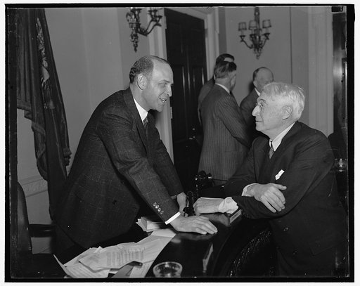 Preparedness is best to keep out of war. Washington D.C. Representative Lister Hill (left), Chairman of the Military Affairs Committee of the House is shown talking to Bernard M. Baruch a New York financier who testified before the Committee today. He stated that the cash on the line was one of the 