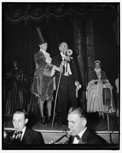 Vase disguise awarded prize at colorful ball in Capitol. Washington D.C. A prize well deserved was awarded to A. Richard Hill who attended Washington's colorful Bal Boheme Ball last night representing a Louis XIV vase. Receiving honorable mention for the most original costume Hill is shown being int