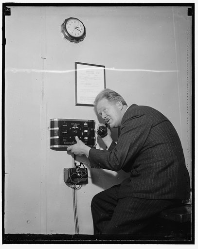 Safety device for blind landing of air-track. Washington D.C. The monitoring device of the air-track blind landing in the above photo tells the man on the ground if all the beams are being sent out correctly if there is any error in transmission of the beams this machine will pick It up immediately 
