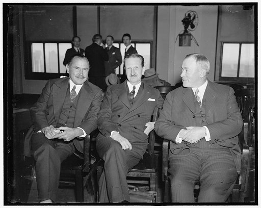 Two unidentified men & Walter Teagle