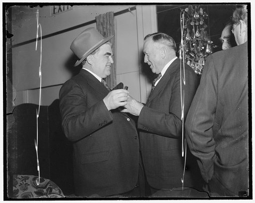Rebel chieftain smiles. Washington D.C., March 8. Rarely do you see a smiling picture of John L. Lewis, President of the United Mine Workers and Chairman of the Board of the Labor Nonpartisan League. The Rebel Labor Chieftain is pictured here as he arrived to attend the convention of the Labor Nonpa