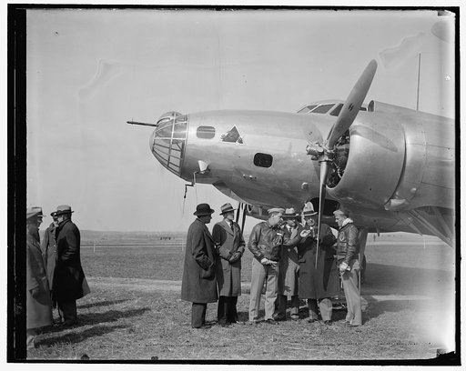 Solons inspect new Army Bomber. Washington, D.C. March 10. Members of the House Military Affairs Committee with U.S. Chief of staff General Mailin Craig inspecting the new 4-Engine Boeing Bomber which arrived at Bolling Field today. This ship is first of 13 which will be delivered to the Army Air Co