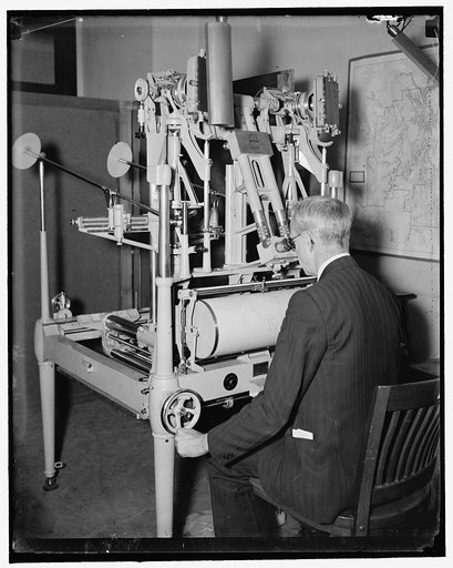 Geological Survey, Dept. Interior. Washington, D.C., Mar. 13. E.A. Shuster working with the erocartograph constructing topographies from airplane pictures