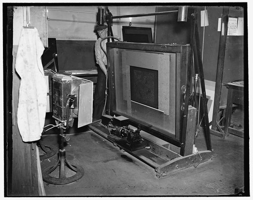 Washington, D.C., Mar. 13. H.C. Yates with the process printing frame printing direct from negative to metal plate. At the geological survey