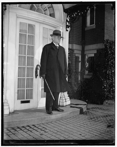 "71" on St. Patrick's Day. Washington, D.C., March 17. Justice Pierce Butler, 71 years old today celebrates his birthday by taking his morning walk, snapped while leaving his home on 19th St. altho the Supreme Court is in 2 weeks recess Justice Butler continues his work on Supreme Court cases at hom