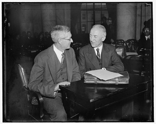 Appear before the Senate Judicary. Washington, D.C., March 18. Appearing before the Senate Judicairy Committee today in defense of the Presidents Supreme Court reorganization plan were Charles Grove Haines of the University of Calif. who is a Professor of Political Science, left: and Dean Leon Green