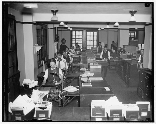Clerks of the Reconstruction of Finance and Commodity Credit Corporation checking and tabulating loans and interest on loans