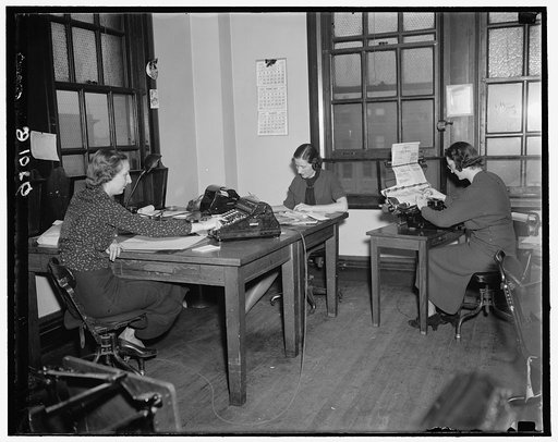 Clerks at the Reconstruction Finance Corporation computing interest on RFC loans