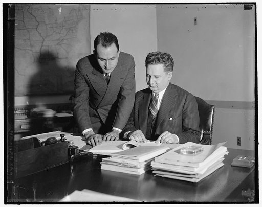 Hammond E. Chaffetz, standing. John Henry Lewin, seated. Both are Special Assistant to the Attorney General