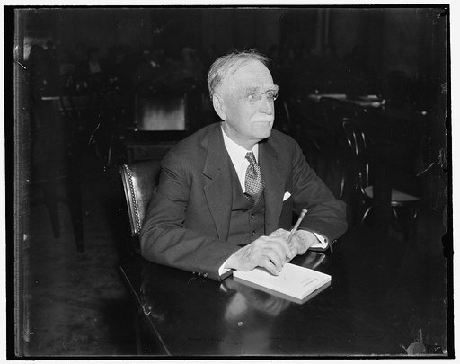 In spotlight before Senate Judiciary Committee. Washington, D.C., April 6. Former President of the New York Bar, Charles C. Burlingham, appeared before the Senate Judiciary Committee today to voice his opposition to President Roosevelt's court reorganization plan. Burlingham told the Committee that 