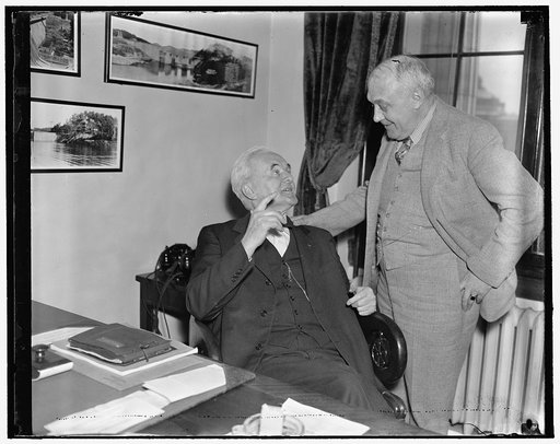 Sen. Norris & Rep. Knutson. Washington, D.C., April 7. Two members of Congress who voted against the bill for the World War are shown going over old times. Left to right: Senator George Norris of Neb. and Representative Harold Knutson of Minn., 4/7/1937