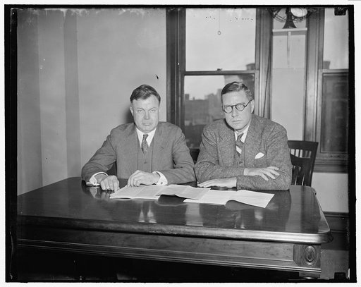 Members of the National Labor Relations Board J. Warren Madder, Chairman, on the left and Edwin S. Smith, member, right
