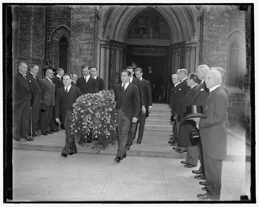Last rites for Forbes Morgan. Washington, D.C., April 23. President and Mrs. Roosevelt headed a list of dignitaries attending the funeral services for W. Forbes Morgan, former Treasurer of the Democratic Nation Committee, in the Capital today. The body is shown being carried thru the lane of honorar