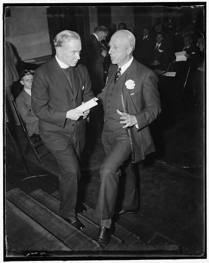 Discuss progress of U.S. Chamber of Commerce. Washington, D.C., April 27. Rev. Edmund A. Walsh, S.C., (left) Vice President of Georgetown University discusses with Harper Sibley, President of the U.S. Chamber of Commerce, the progress the organization has made during the 25 years of its existence. F