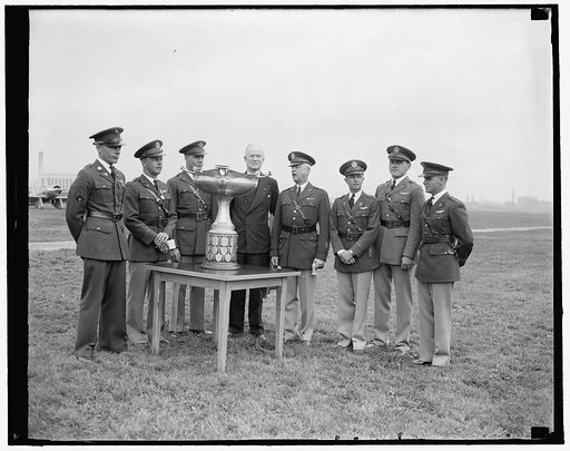 U.S. Flyers win Mackay Award. Washington, D.C., May 8. Nine officers and enlisted men of the U.S. Air Corps were today presented with the Mackay trophy for 1936 as a reward for the heroic flight under unfavorable weather conditions from Langley Field, Va., to Allecan, Mich., last August. The trophy,