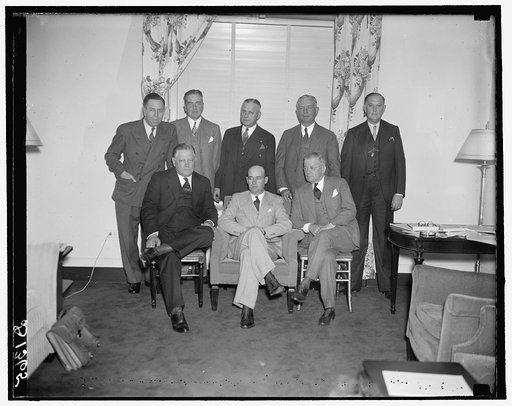 National Lumber [...] Ass'n. [...] and Executive Committee at Raleigh Hotel. Front row, left to right: Frank Carnahan, Wash., D.C., Secretary [?]; Don Campbell, Lebanon, Ky., President; George [...]inte, Jr., Menomonie, Wisc., Treasurer. Back row, left to right: W.W. Anderson, Ogden, U.