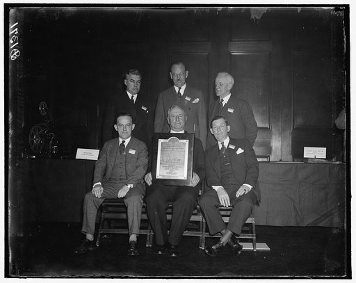 Awa[...]ntest. Front row, left to right: William J. Ennis, Michael T. Kenns[...]; John J. McNally