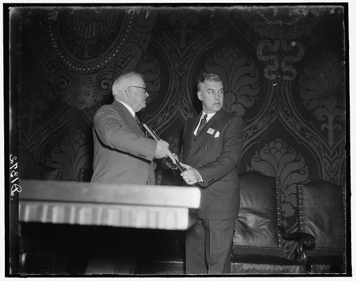 ...]ank Charlesworth receiving award from Joseph [...]ans in fire waste contest