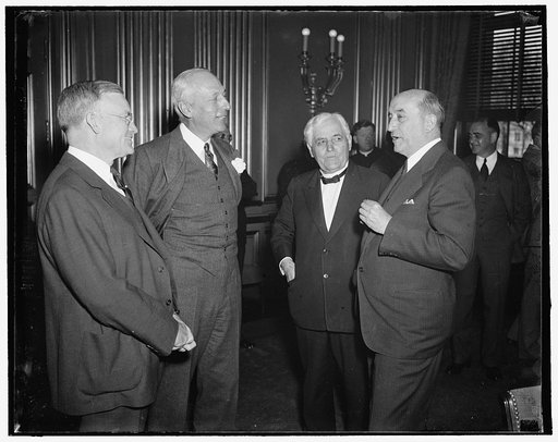 Labor and industrial leaders get together. Washington, D.C., May 4. Leaders of labor and industry pictured as they met today at the Labor Department shortly before the conference called by Secretary Perkins convened. prominent figures in labor and industry attended the meeting in efforts to develop 