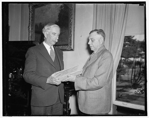 Smithsonian receives first farm tile. Washington, D.C., May 6. Dr. C.G. Abbott of the Smithsonian Institute (left) and Professor B.B. Ross (right) Agriculture Engineer of Cornell University who dug up the 190 year old sections from the John Johnston Farm on the shore of Seneca Lake, Seneca County, N