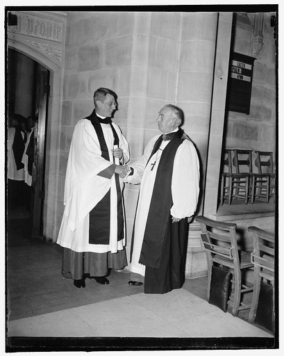 New Dean at Washington Cathedral. Washington, D.C., May 6. The new Dean at the Washington Cathedral is being congratulated after the ceremonies of taking his new office were completed. The new Dean, the very Reverend Noble Cilley Powell DD. late of the Emanuel Church in Baltimore, MD. (left) being c