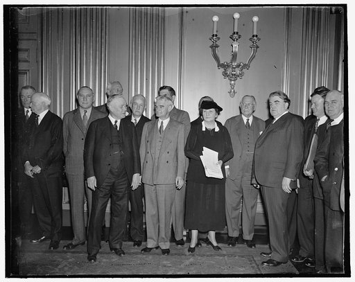 Labor peace plan sought. Washington, D.C., April 20. Leaders of labor and industry attended a conference today with Secretary of Labor Perkins in efforts to effect a National policy to avert strikes and lockouts. In the photograph, left to right: D.W. Tracy, President of Brotherhood of Electrical Wo