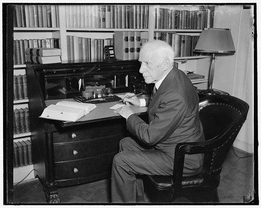 Justice Van Devanter retires. Washington, D.C., May 19th. Justice Willis Van Devanter, after 26 years of service with the Supreme Court sent his resignation to the president to become effective June 2nd, seldom photographed the judge let news photographer snap him while cleaning up his desk