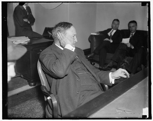 Doomed for the seat on the Supreme bench. Washington, D.C., May 21. Senator Joe Robinson of Ark. who is rumored will be the President's choice to fill the vacancy of Justice Van Devanter who recently resigned from the Supreme Court is shown in an attentive mood at the Capitol. The Senator is 64 year