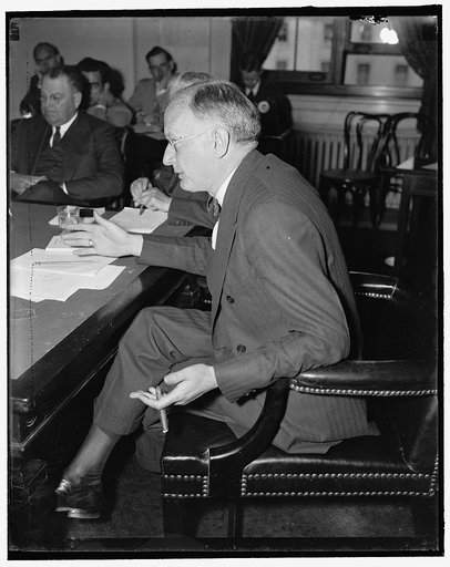 Montana Senator. Washington, D.C., May 24. Senator Burton K. Wheeler, of Montana, pictured in his office at the Capitol today. Although a Democrat, Senator Wheeler is one of the leaders in fight against the president's court reorganization plan, 5/24/1937