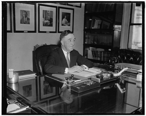 New Chief of Insular Affairs. Washington, D.C., May 24. Brig. Gen. Charles Burnett pictured at his desk in War Department today following his induction as Chief of the Bureau of Insular Affairs. He succeeds Brig. Gen. Creed F. Cox, 5/24/37